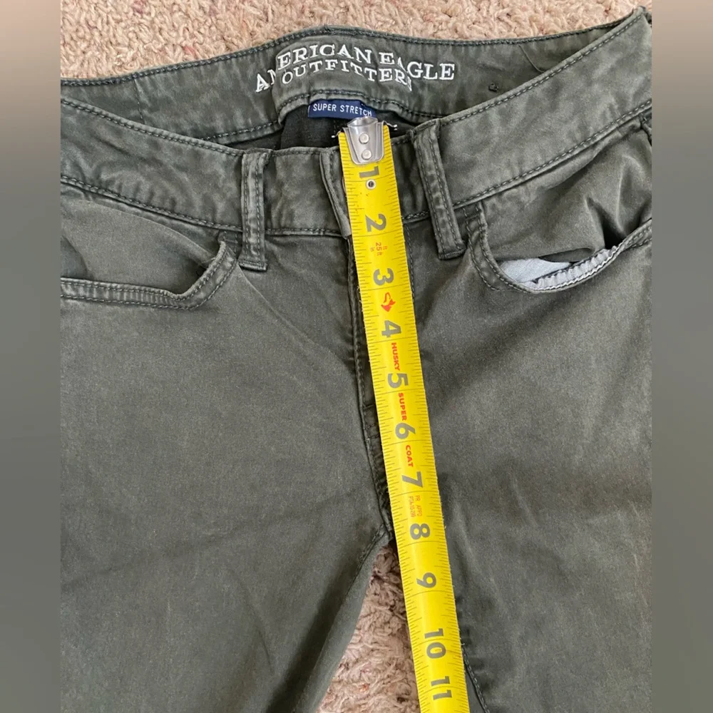 American Eagle Distressed Green Jeggings size 2